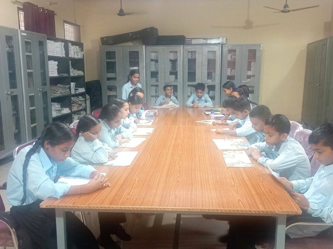 Students reading in the school library