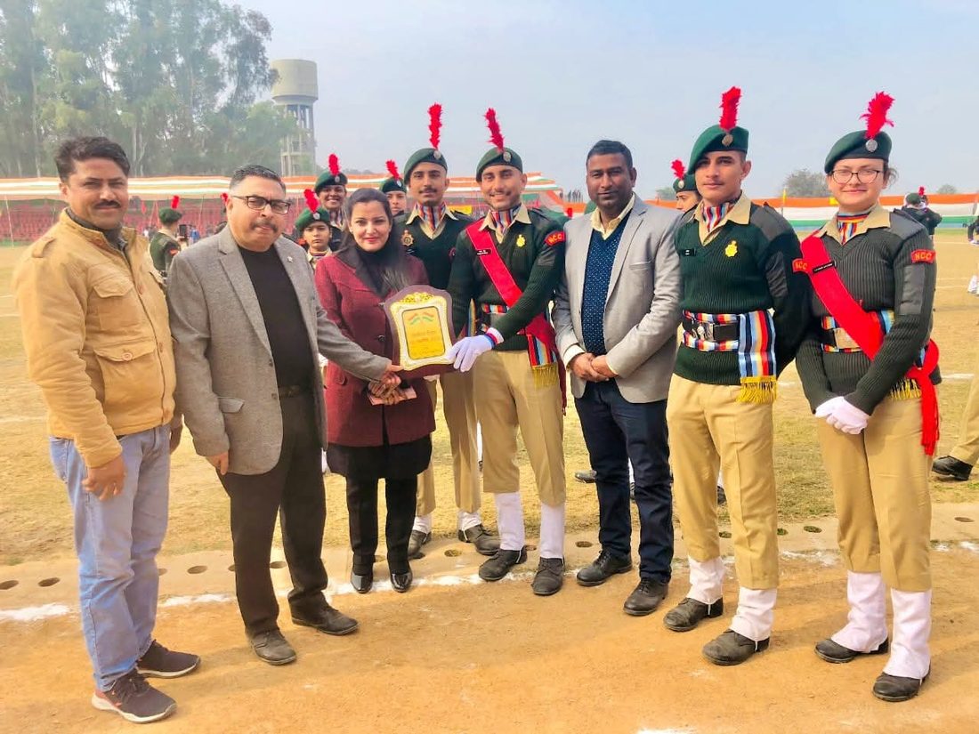 NCC cadets receiving a plaque on Republic Day